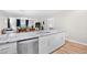 Open concept kitchen with stainless appliances, granite counters and breakfast bar, seamlessly connecting to the living area at 1204 River Oak Dr. # 25-A, Myrtle Beach, SC 29579