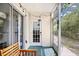 Welcoming outdoor patio with string lights and a glass door that provides tons of sunlight at 1204 River Oak Dr. # 25-A, Myrtle Beach, SC 29579