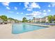 Beautiful outdoor pool and lounge area with multiple lounge chairs, perfect for warm weather at 1204 River Oak Dr. # 25-A, Myrtle Beach, SC 29579