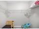 Walk-in closet with wire shelving, ample storage space and wood-look flooring at 1204 River Oak Dr. # 25-A, Myrtle Beach, SC 29579