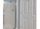 This bathroom features a glass shower door, and painted blue walls at 130 Scotch Broom Dr. # H-103, Little River, SC 29566
