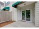 This patio offers sliding door access, along with a privacy fence at 130 Scotch Broom Dr. # H-103, Little River, SC 29566