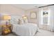 Cozy bedroom with a plush bed, stylish decor, and a serene ambiance for restful nights at 1301 Bay View Ct., North Myrtle Beach, SC 29582