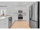 Well-equipped kitchen featuring stainless steel appliances, sleek countertops, and ample cabinet space at 1301 Bay View Ct., North Myrtle Beach, SC 29582