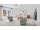 Bright living room with neutral tones, coastal decor, and a window with neighborhood views at 1301 Bay View Ct., North Myrtle Beach, SC 29582
