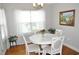 Dining room featuring a white table set and picture window at 1308 Riverport Dr., Conway, SC 29526