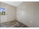 Laundry room boasts a door to the exterior and convenient shelving at 1310 Rabbit Ln., Conway, SC 29526