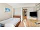 Bedroom featuring one bed, TV, and a work area with a granite counter top at 1501 S Ocean Blvd. # 1044, Myrtle Beach, SC 29577