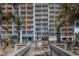 Full exterior shot from ground level highlighting the building's multiple balconies and access to the beach at 1501 S Ocean Blvd. # 1044, Myrtle Beach, SC 29577
