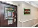 A community hallway with a door to The Snack Shack which offers Debit & Card Only payment at 1501 S Ocean Blvd. # 1044, Myrtle Beach, SC 29577