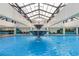 Magnificent indoor pool area with an elaborate fountain as the focal point at 1501 S Ocean Blvd. # 1044, Myrtle Beach, SC 29577
