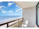 Balcony overlooking a white sandy beach and sparkling ocean at 1501 S Ocean Blvd. # 842, Myrtle Beach, SC 29577