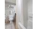 Well-maintained bathroom with white fixtures and tile flooring at 1501 S Ocean Blvd. # 842, Myrtle Beach, SC 29577