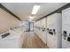 Bright laundry room with rows of new washers and dryers at 1501 S Ocean Blvd. # 842, Myrtle Beach, SC 29577