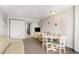 Comfortable living room with table, chairs, and a view of the kitchen at 1501 S Ocean Blvd. # 842, Myrtle Beach, SC 29577