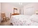 Bedroom with floral bedding, neutral carpet and a ceiling fan at 1504 Sedgefield Dr., Murrells Inlet, SC 29576