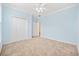 Bedroom with carpet, ceiling fan and closet at 1504 Sedgefield Dr., Murrells Inlet, SC 29576