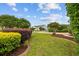 Well-manicured front yard with lush landscaping and a view of the home at 1504 Sedgefield Dr., Murrells Inlet, SC 29576