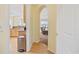 Hallway view showcasing the kitchen and living room, enhancing the home's layout and flow at 1504 Sedgefield Dr., Murrells Inlet, SC 29576