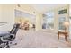 Spacious living area featuring vaulted ceilings and large windows with views at 1504 Sedgefield Dr., Murrells Inlet, SC 29576