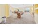 Open-concept living and dining area with large windows providing ample natural light at 1504 Sedgefield Dr., Murrells Inlet, SC 29576