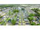 An aerial shot showcasing the neighborhood's layout, highlighting ponds and green spaces at 155 Marsh Deer Place, Surfside Beach, SC 29575
