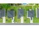 Aerial shot of the houses showing the roofing and the well manicured lawn at 155 Marsh Deer Place, Surfside Beach, SC 29575