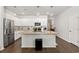 Spacious kitchen island with granite countertops and stainless steel appliances, ideal for entertaining at 155 Marsh Deer Place, Surfside Beach, SC 29575