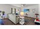 Comfortable living room with hardwood floors, lots of natural light, and a modern aesthetic at 155 Marsh Deer Place, Surfside Beach, SC 29575