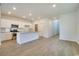 Modern kitchen featuring white cabinets, granite countertops, and stainless steel appliances at 162 Waterloo Sunset Dr., Longs, SC 29568