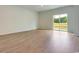 Bright living room with sliding glass doors that open to the outdoors at 162 Waterloo Sunset Dr., Longs, SC 29568