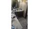Bathroom with dual sinks and a tile floor at 1769 Crooked Pine Rd., Surfside Beach, SC 29575