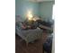Bedroom with twin beds, blue walls, and wood laminate floors at 1769 Crooked Pine Rd., Surfside Beach, SC 29575