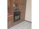 Kitchen cabinets with microwave, oven, and tile flooring at 1769 Crooked Pine Rd., Surfside Beach, SC 29575