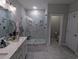 Bathroom features a walk-in shower with glass doors and dual showerheads at 18 Trigger Fish Ln., Murrells Inlet, SC 29576