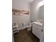 Half bath features a toilet and vanity with a white countertop and a sink at 18 Trigger Fish Ln., Murrells Inlet, SC 29576