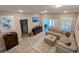 Comfortable living room with large sectional sofa and TV, perfect for relaxing and entertaining at 18 Trigger Fish Ln., Murrells Inlet, SC 29576