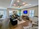Spacious living room features recessed lighting, a ceiling fan, and a large sectional sofa at 18 Trigger Fish Ln., Murrells Inlet, SC 29576