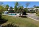 Community pool with lush green landscaping and fencing, set in a desirable neighborhood at 18 Trigger Fish Ln., Murrells Inlet, SC 29576