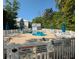 Community pool with surrounding lounge chairs and tables at 18 Trigger Fish Ln., Murrells Inlet, SC 29576