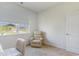 Bright bedroom features a chair, window, and carpeted floor at 1804 Castlebay Dr., Conway, SC 29526