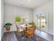 Dining room featuring wood chairs, table, and a sliding glass door at 1804 Castlebay Dr., Conway, SC 29526