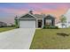 Charming single story home with a two car garage and manicured lawn at 1804 Castlebay Dr., Conway, SC 29526