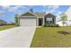 Charming single story home with a two car garage and manicured lawn at 1804 Castlebay Dr., Conway, SC 29526