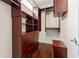 Spacious walk-in closet with custom wood shelving and drawers for ample storage at 1881 Willowcress Ln., Myrtle Beach, SC 29577
