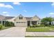 Charming home with a welcoming front porch, well-kept lawn, and a two-car garage at 1881 Willowcress Ln., Myrtle Beach, SC 29577