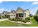 Well-manicured front yard and porch, complementing this charming yellow home at 1881 Willowcress Ln., Myrtle Beach, SC 29577