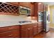 Contemporary kitchen with stainless steel appliances, dark wood cabinets, and granite countertops at 1881 Willowcress Ln., Myrtle Beach, SC 29577