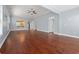 Open-concept living room with hardwood floors and a view to other rooms at 1881 Willowcress Ln., Myrtle Beach, SC 29577