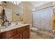This bathroom offers single sink vanity, ample lighting and a tub-shower combination at 195 Cupola Dr., Longs, SC 29568